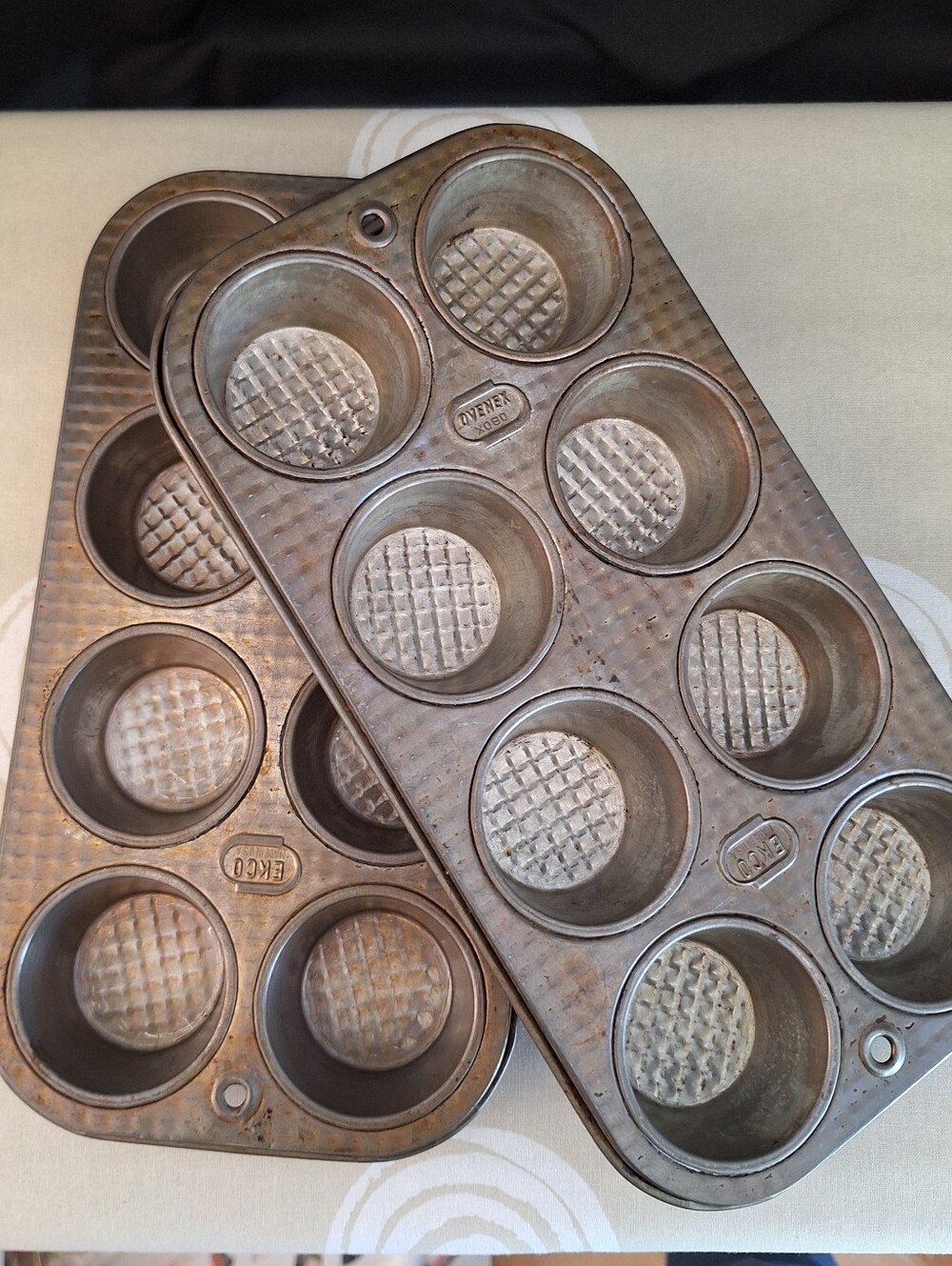 Vintage EKCO Ovenex waffle-pattern metal muffin pans.